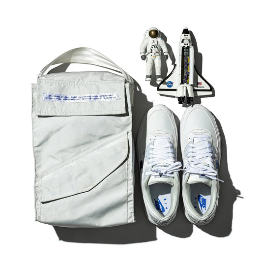 SNOW JACKET CONVERTED TO SHOE BAG - LIM.ED.